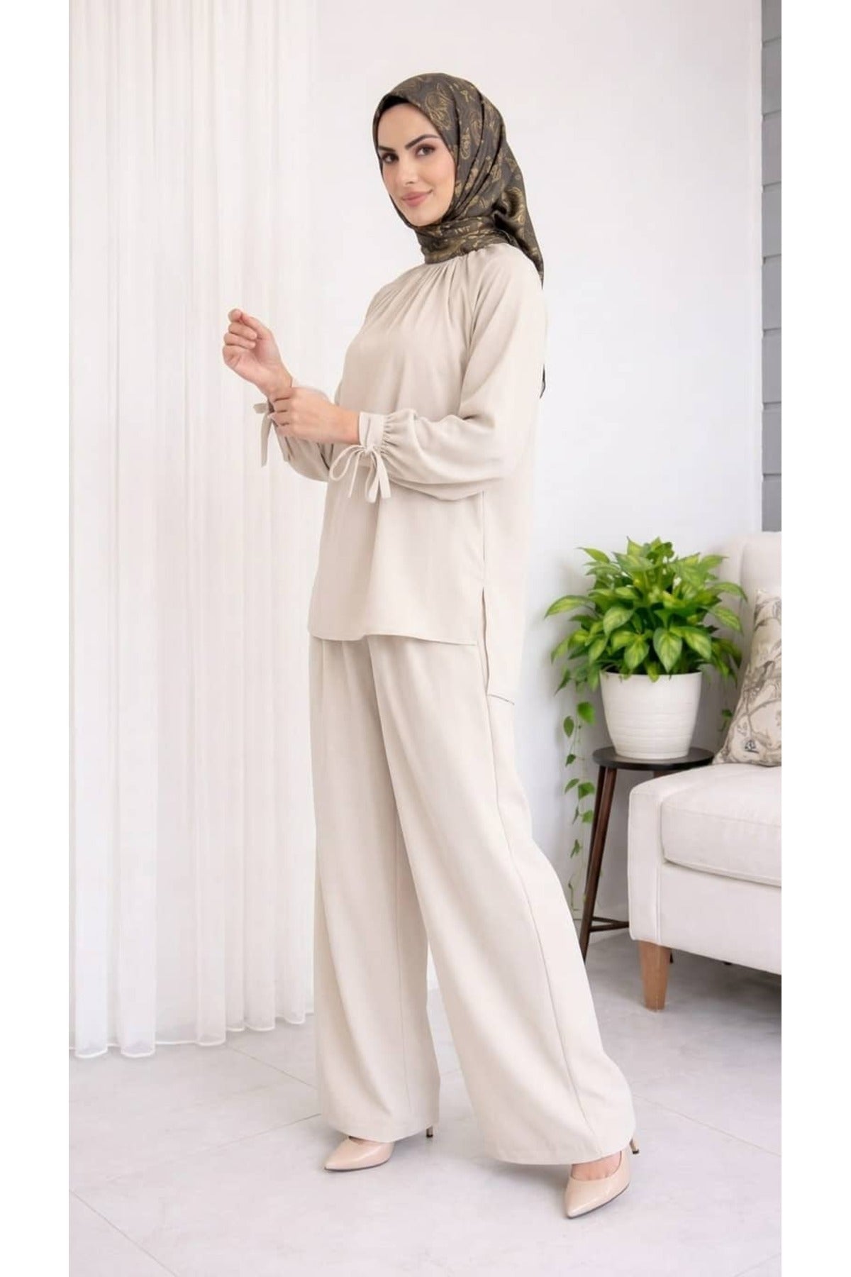 Kolları Bağlamalı Tunik ve Piliseli Geniş Paça Pantolon Takımı
