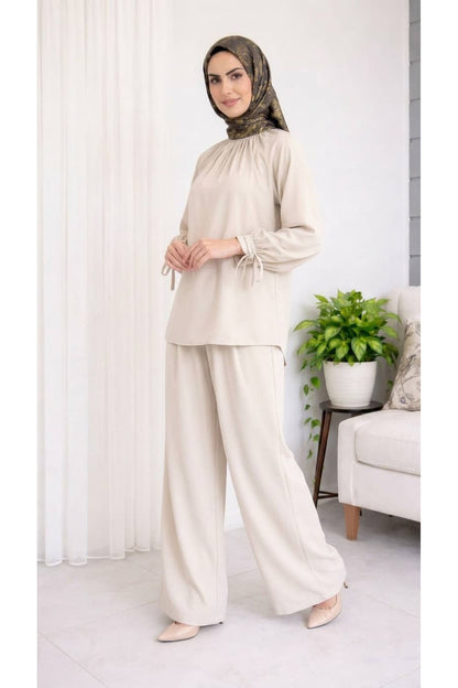 Kolları Bağlamalı Tunik ve Piliseli Geniş Paça Pantolon Takımı