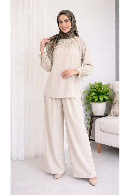 Kolları Bağlamalı Tunik ve Piliseli Geniş Paça Pantolon Takımı